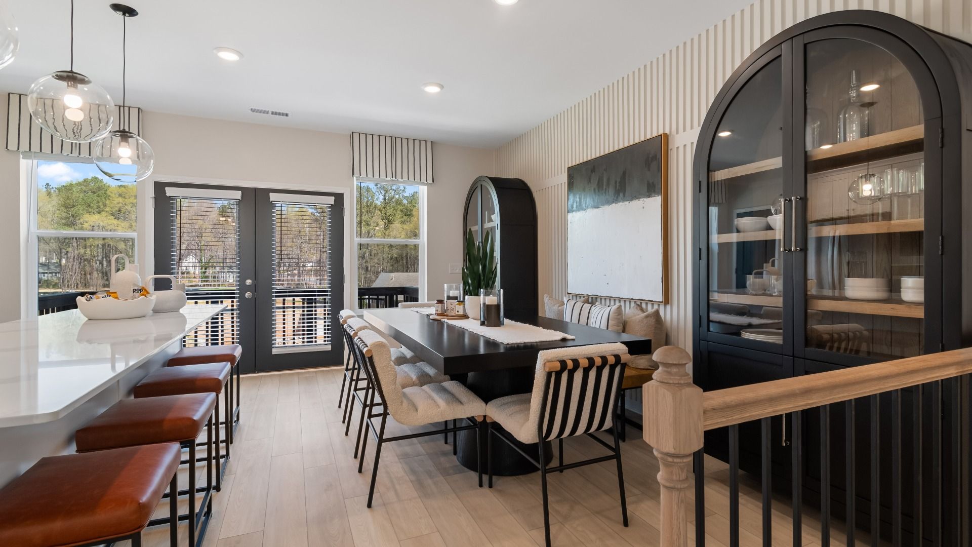 Open dining area with kitchen connection and contemporary designs at Daybreak in Newnan, GA.