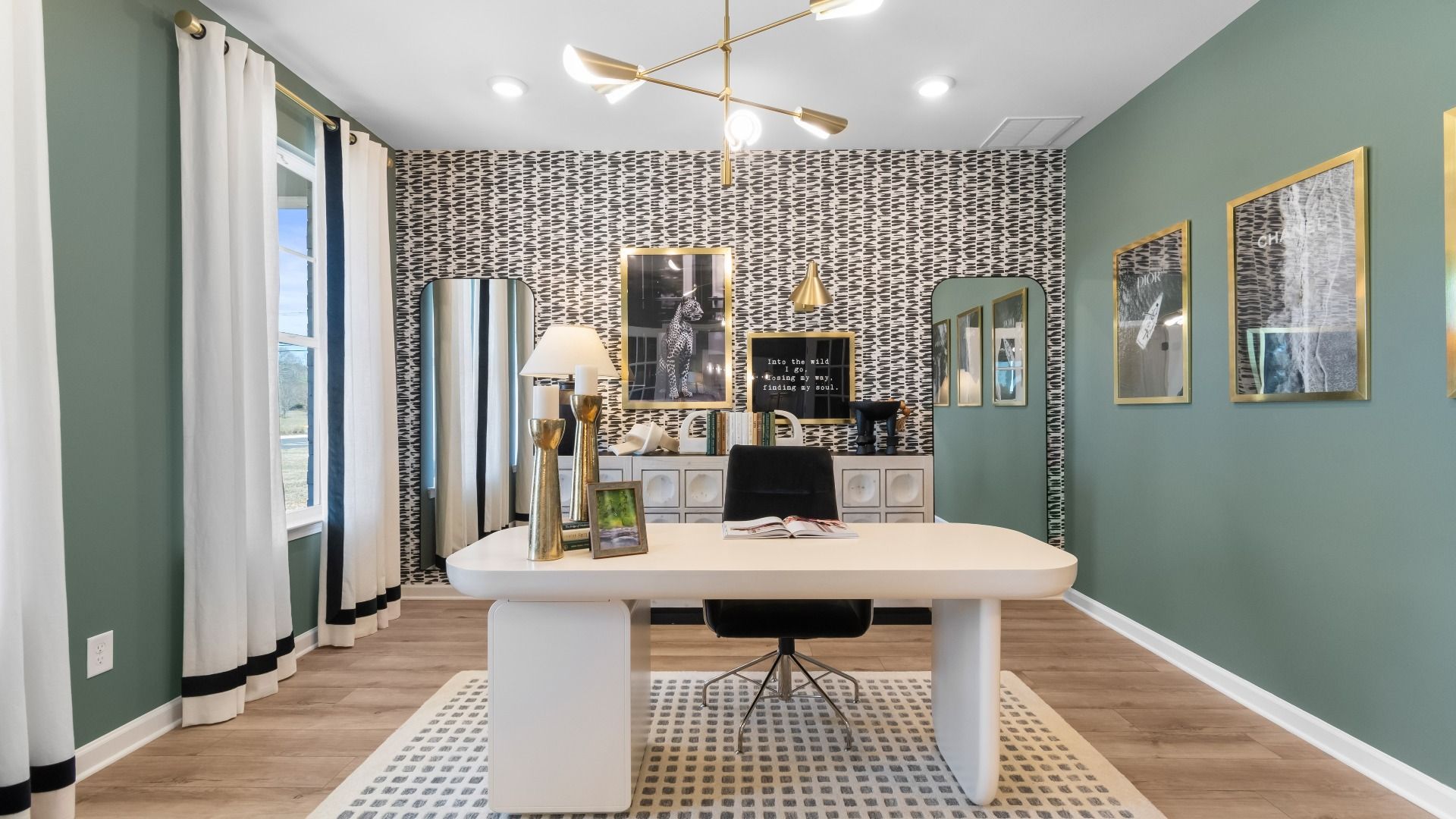 Generously-sized home office space with large window and modern finishes at the Park at Brighton in Locust Grove, GA.