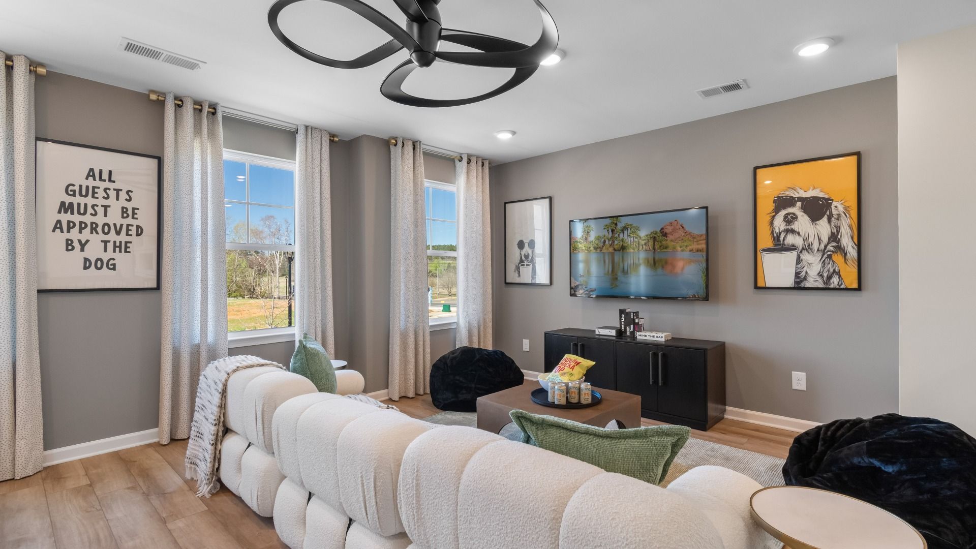 Flexible loft area for versatile living with LVP flooring and natural light at The Park at Brighton in Locust Grove, GA.