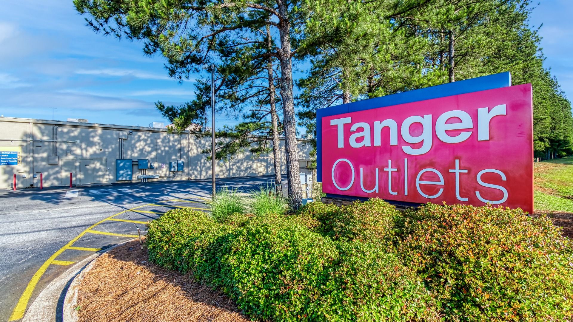 Entry to popular Tanger Outlets outdoor shopping center near The Park at Brighton in Locust Grove, GA.
