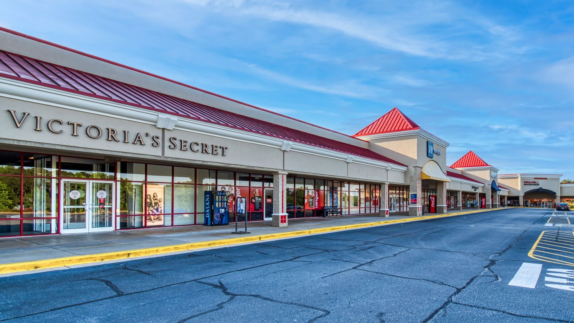 Walkable strip of Tanger Outlets featuring The Gap and other popular stores near The Park at Brighton in Locust Grove, GA.
