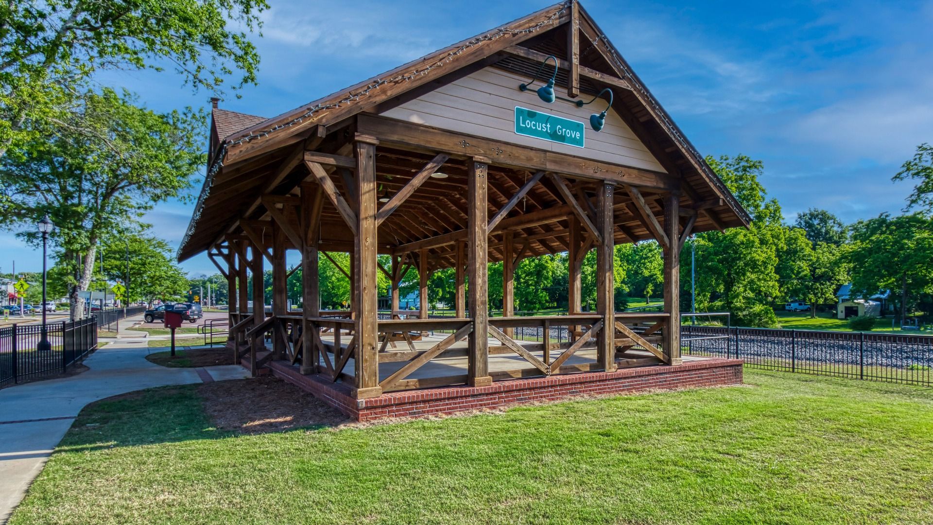 Community pavilion with covered seating, scenic views, and greenspace near The Park at Brighton in Locust Grove, GA.