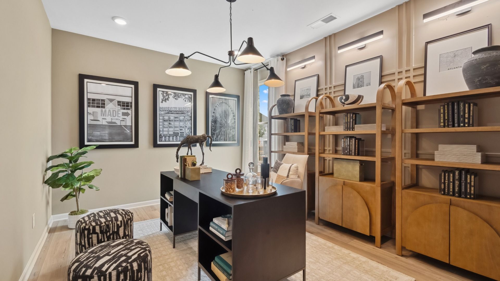 Spacious flex room for office or bedroom with LVP flooring and natural light at Westwind Estates in Hampton, GA.