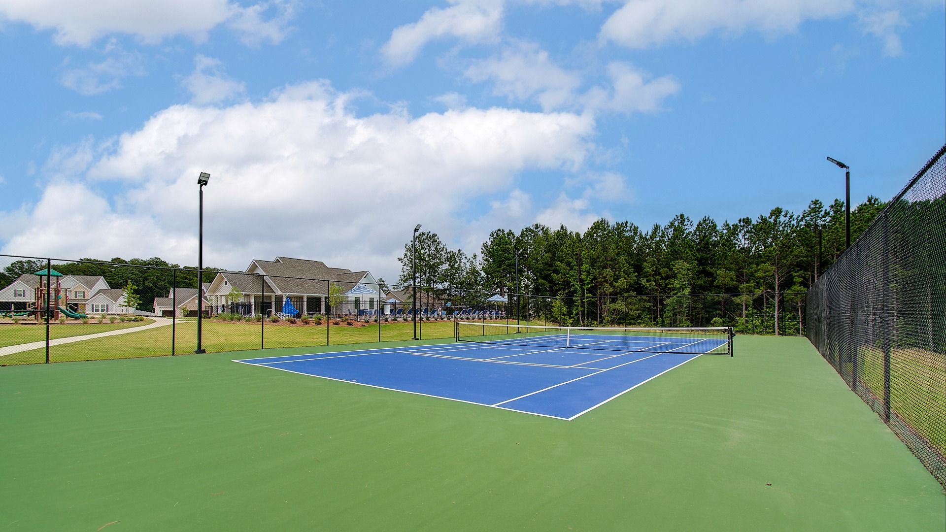 Outdoor tennis court amenity at Kingston in Locust Grove, GA.