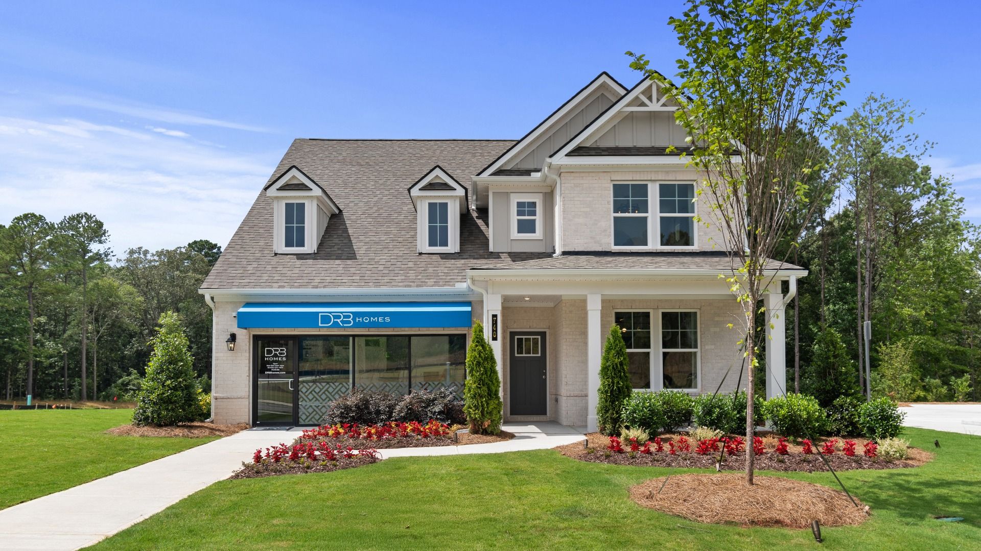 Wynwood single-family home exterior featuring brick and siding design with ample yard space in Lawrenceville, GA.