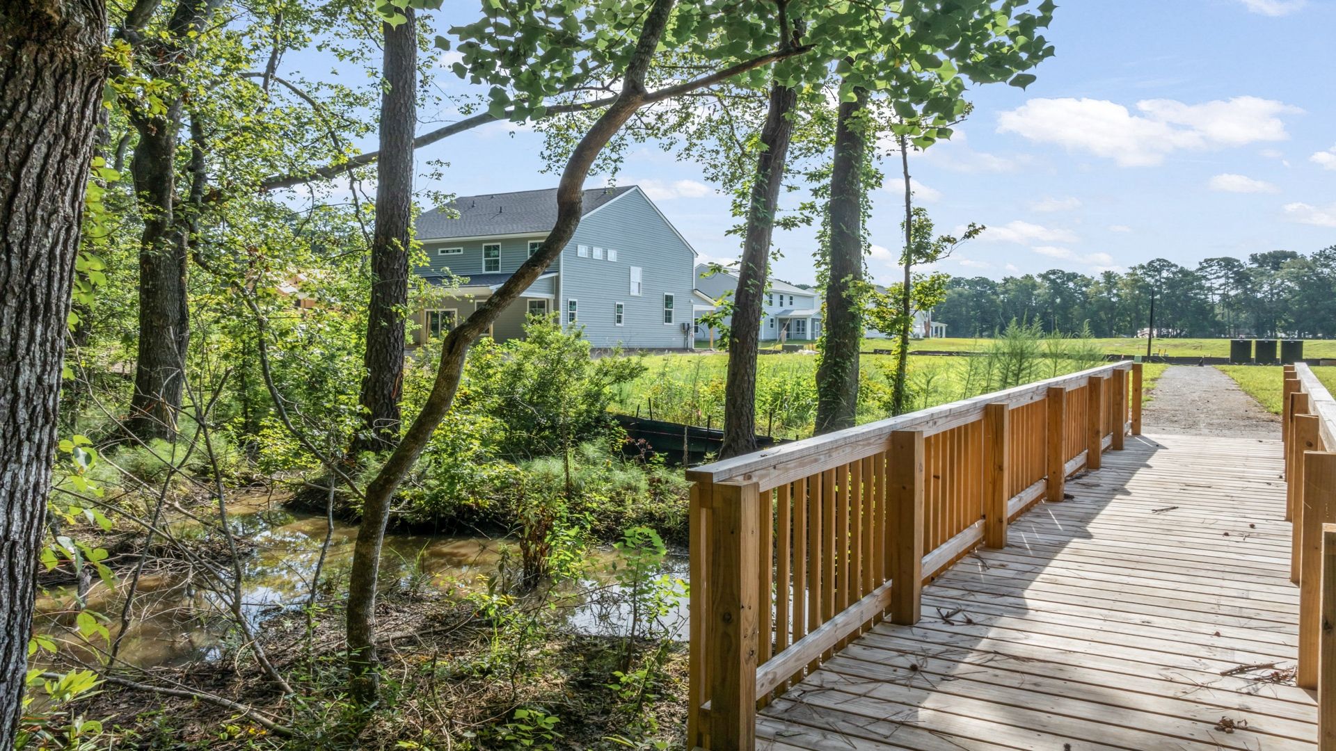 Enjoy peaceful walks along the scenic community nature trail, surrounded by trees and natural Lowcountry landscape