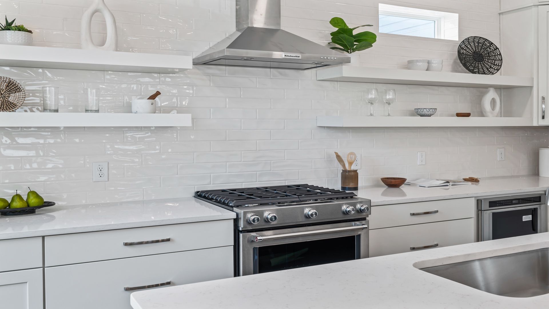 Stylish kitchen in the Sullivan home plan featuring stainless steel appliances, modern cabinetry, and generous prep space.