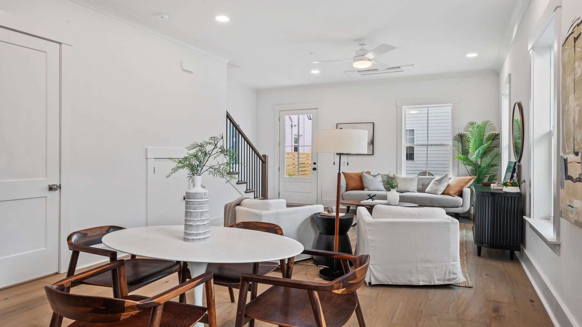 The Sullivan show case home offers an inviting living room with open-concept design and abundant natural light.