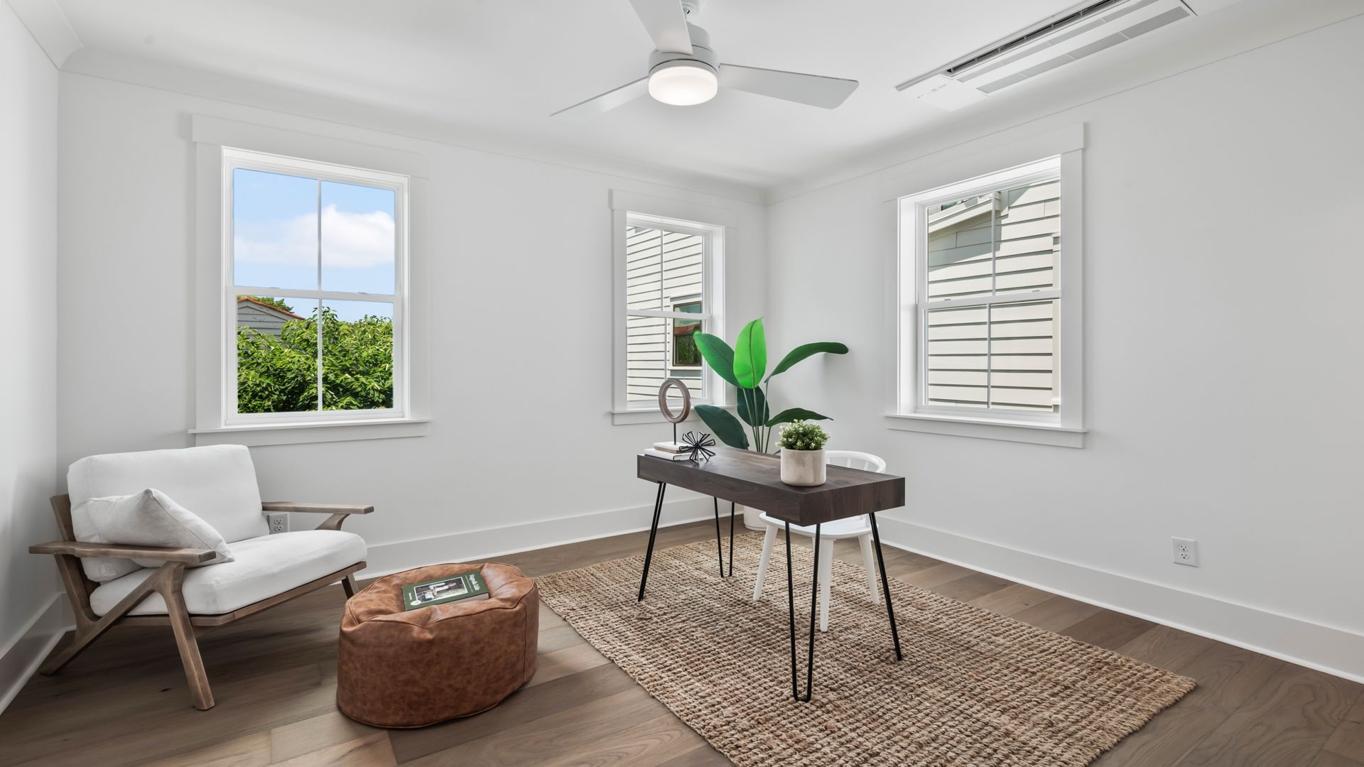 Secondary bedroom in the Sullivan home plan featuring natural light and flexible living space.