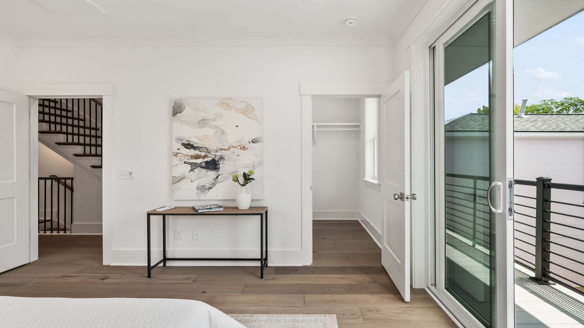 Spacious primary suite in the Sullivan home plan featuring walk-in closet access and elegant design.