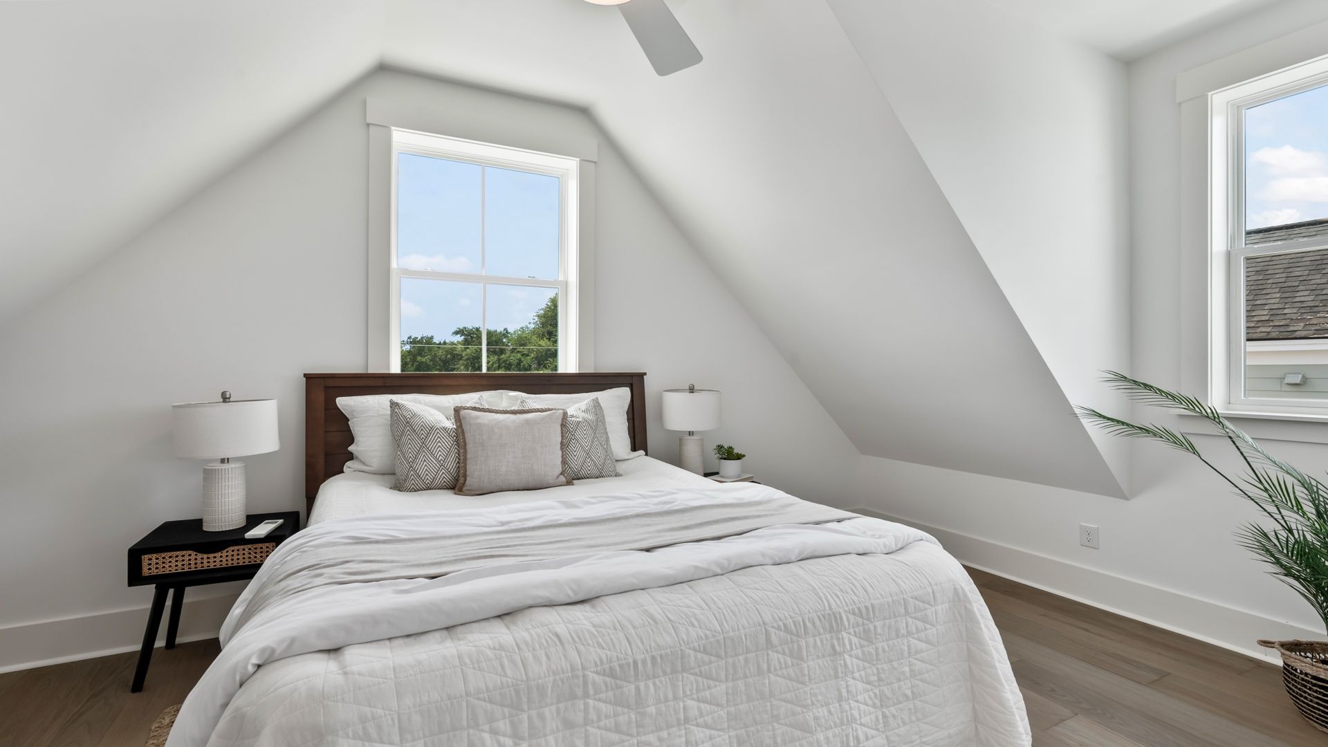 Secondary bedroom in the Sullivan home plan featuring natural light and comfortable living space.