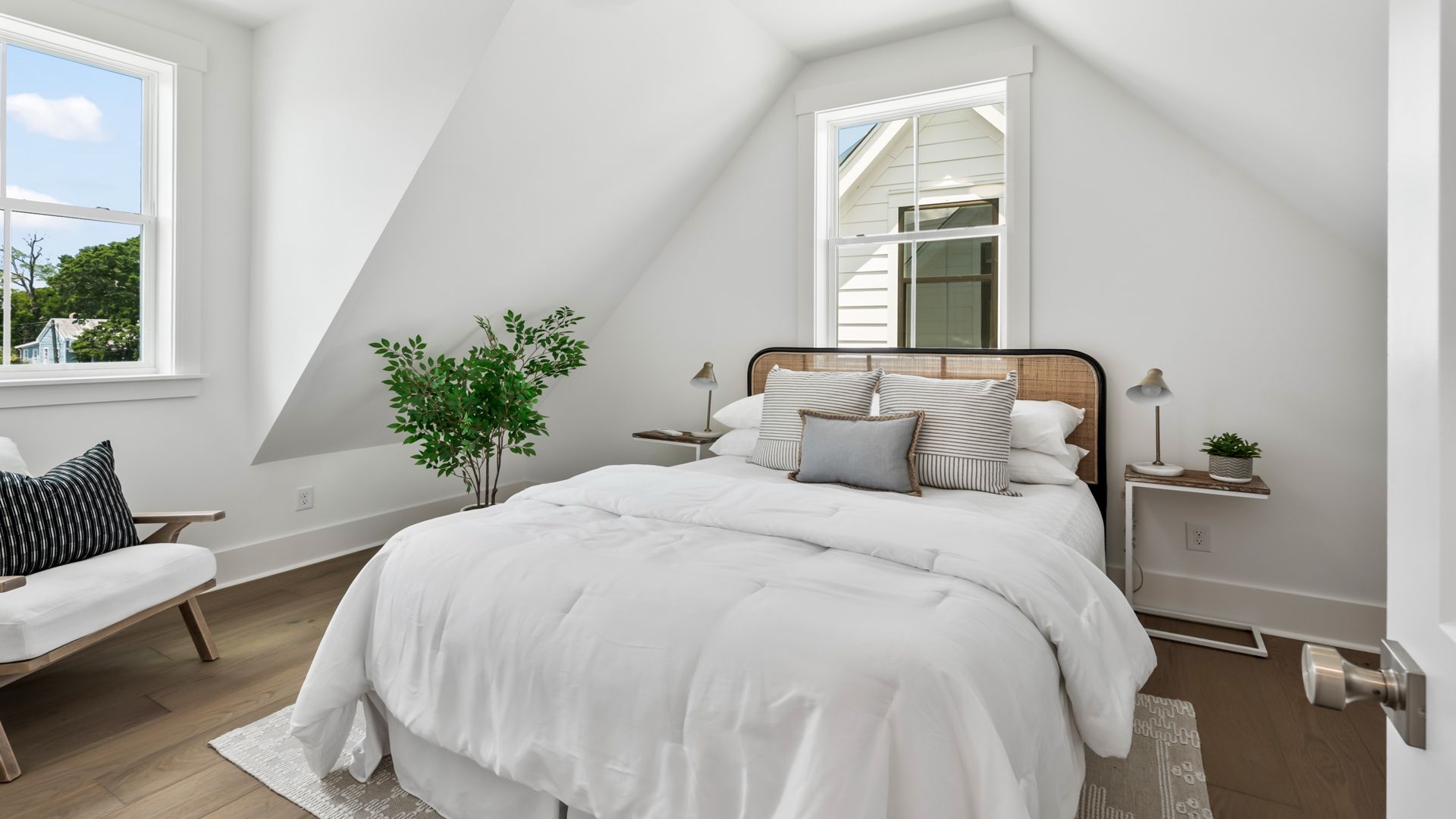 Secondary bedroom in the Sullivan home plan featuring stylish finishes and versatile living space.