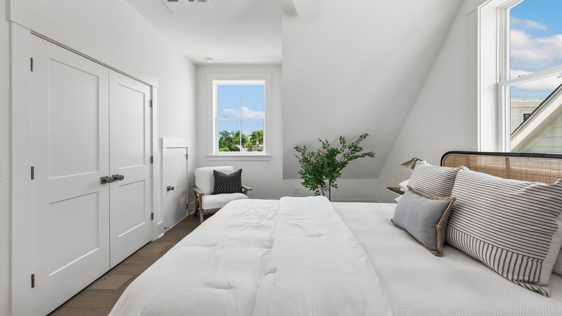 Secondary bedroom in the Sullivan home plan featuring additional storage and flexible living space.