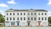 casa en Clear Springs Townhomes por DRB Homes