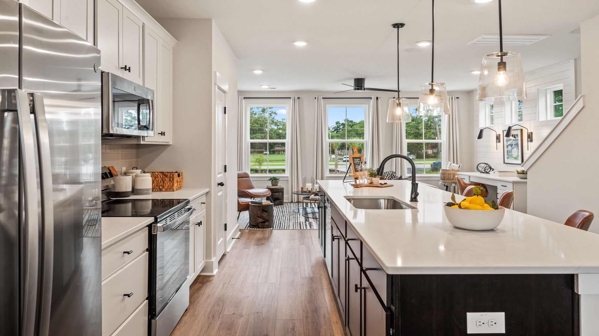 Bright kitchen with stainless steel appliances and spacious island