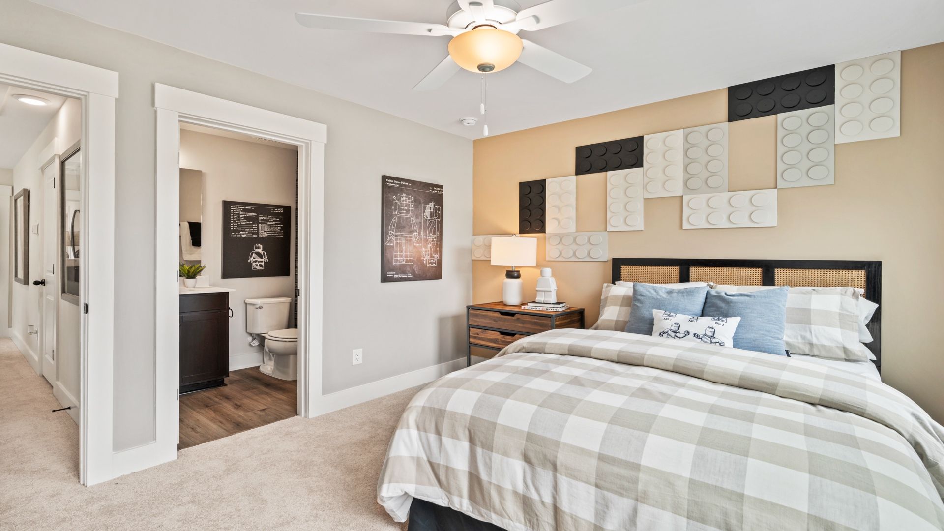 Third-floor bedroom with soft carpet and ensuite bath access