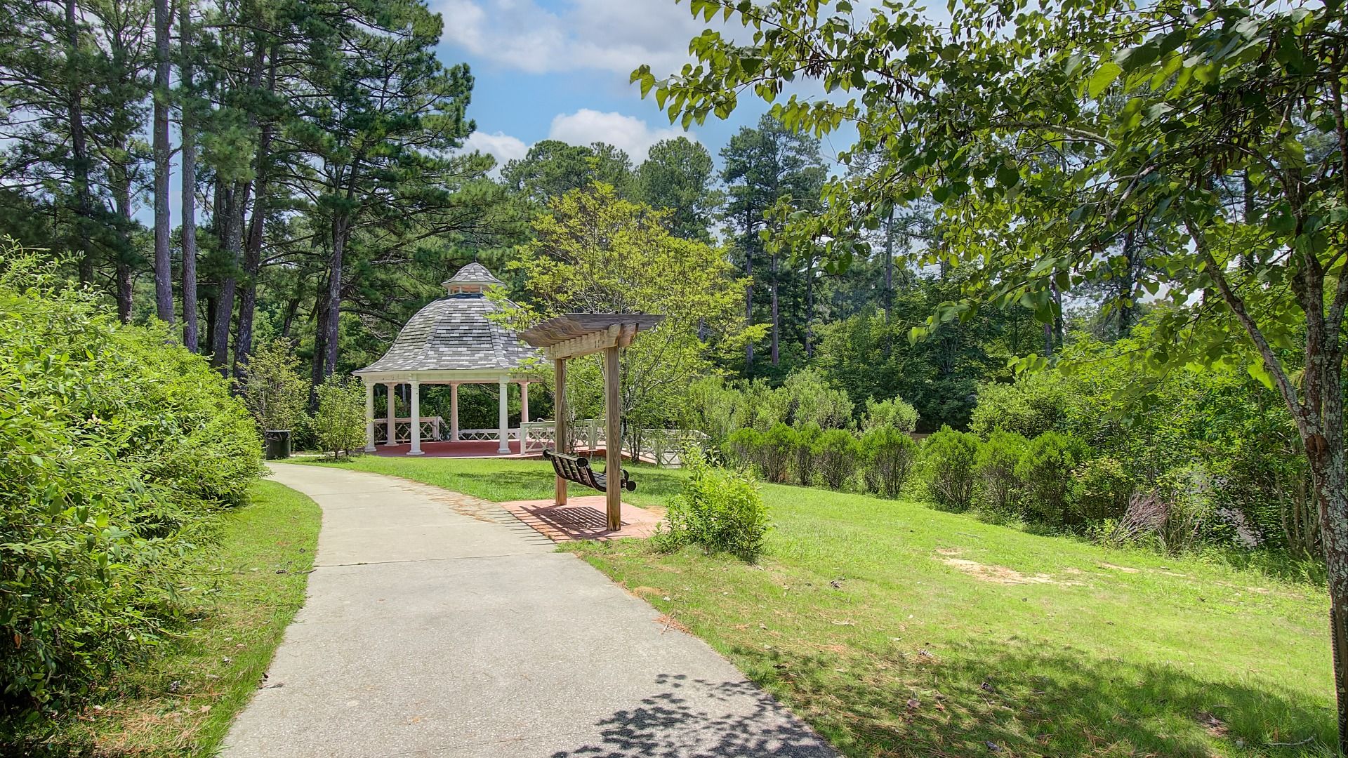 Public nature walking path with gazebo and swing feature near Northcroft in Loganville, GA.