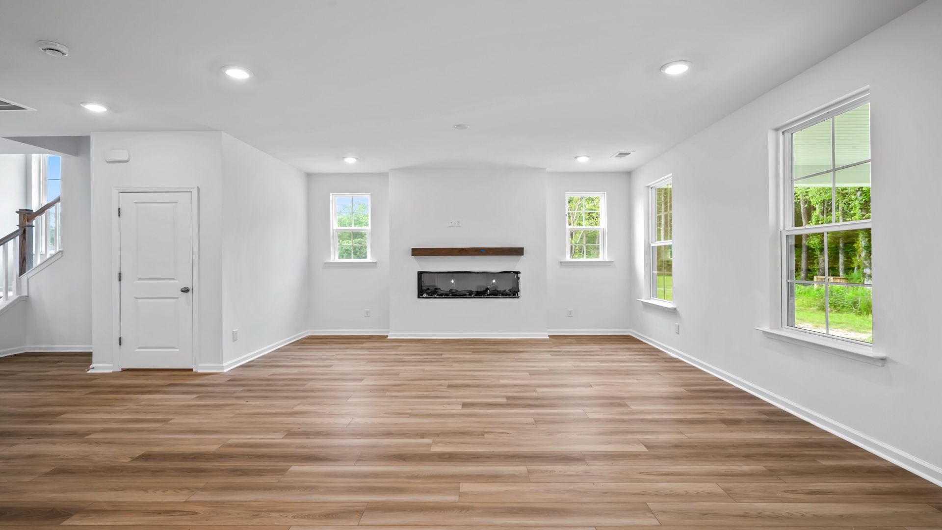 Comfortable living room filled with bright windows