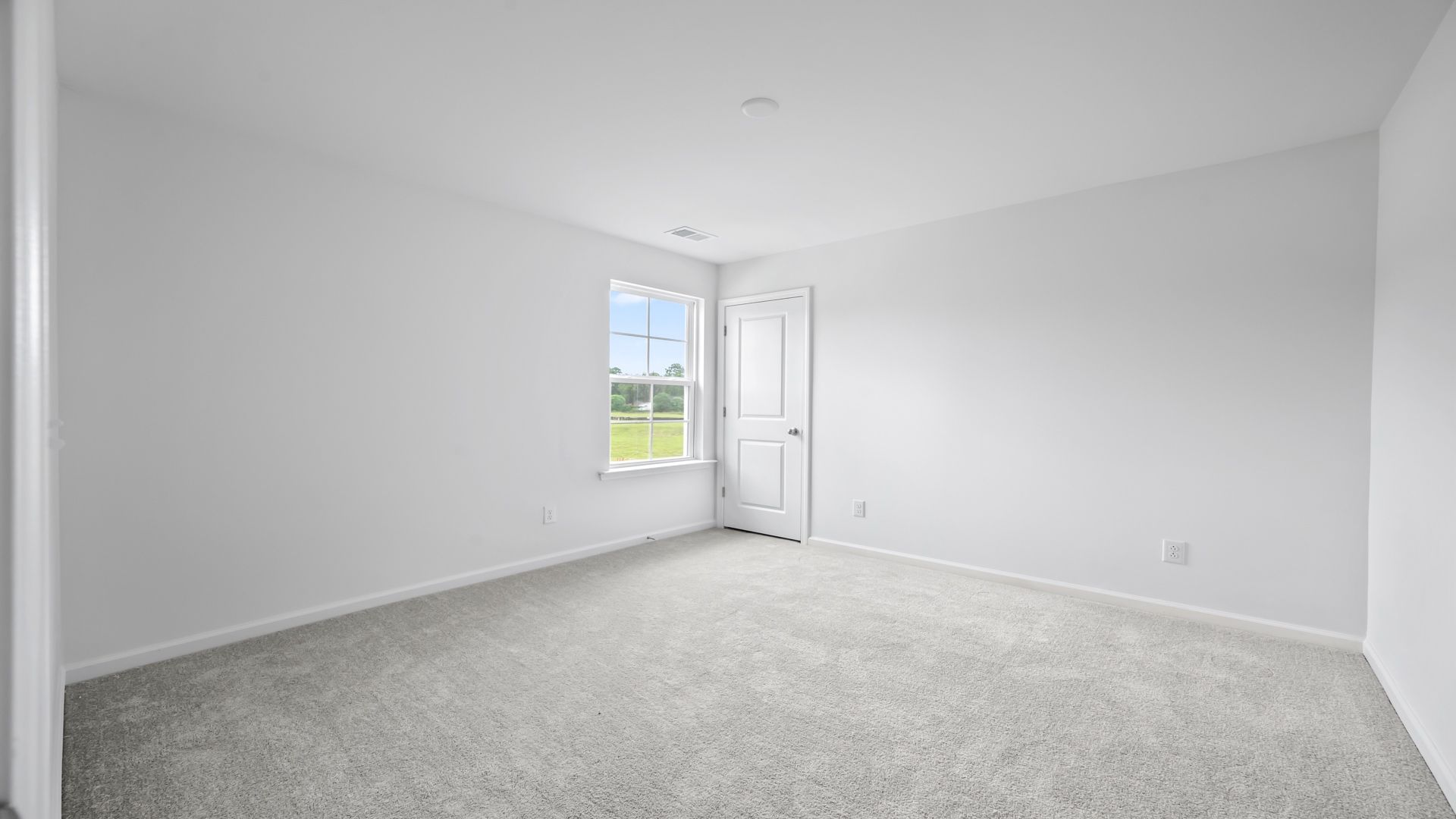 Bedroom 2 in the Pritchard provides comfort and versatility
