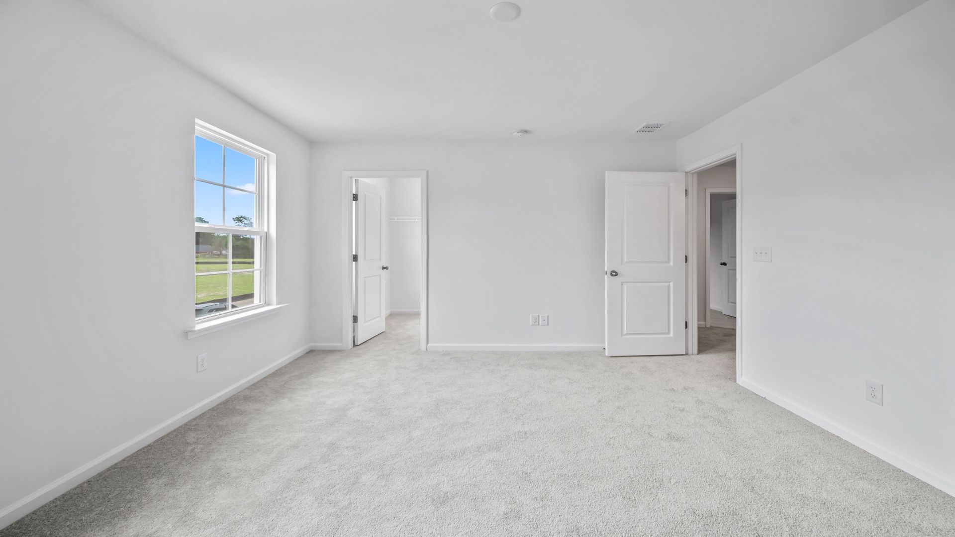 Bedroom 3 in the Pritchard is ideal for family, guests, or flex use