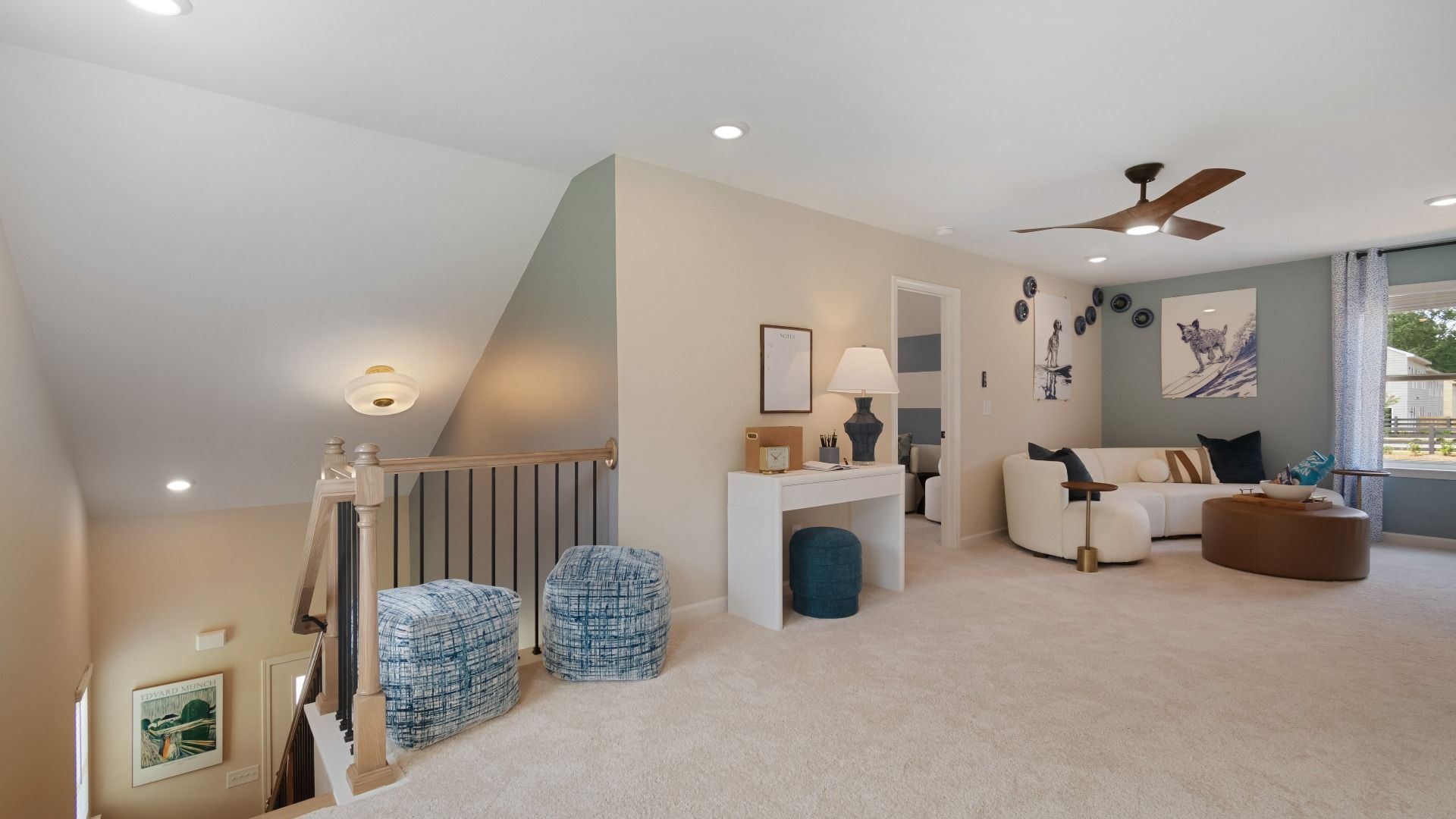 Spacious upstairs loft with plenty of light, perfect for home office or lounge.
