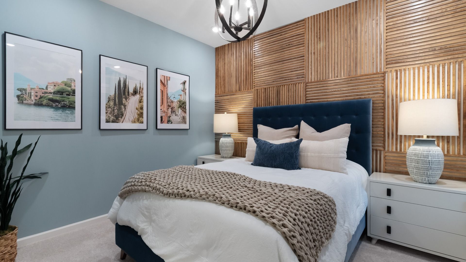 Generously sized bedroom with abundant daylight from expansive windows.