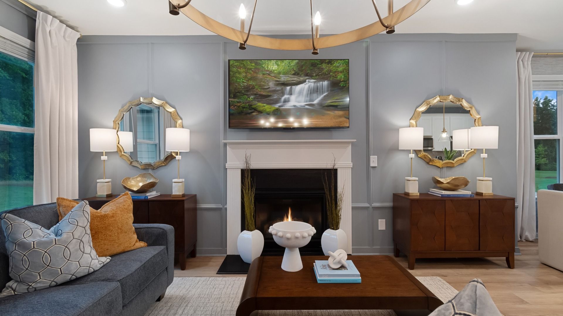 Inviting family room featuring LVP flooring and traditional fireplace with mantel