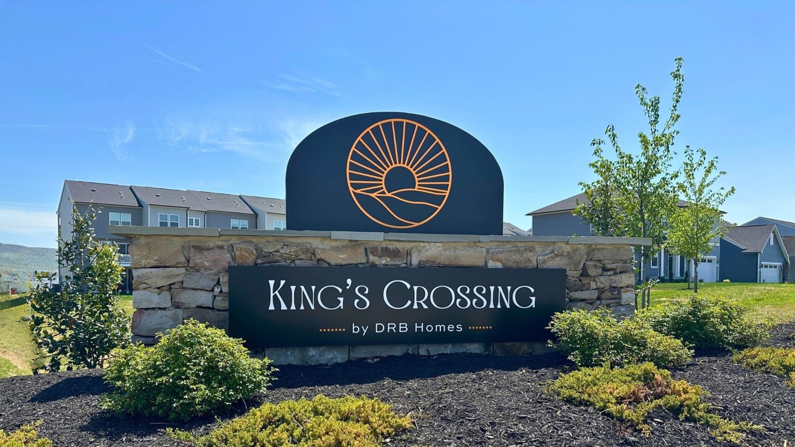 The entrance monument at Kings Crossing in Charlestown, WV, creates a welcoming first impression.