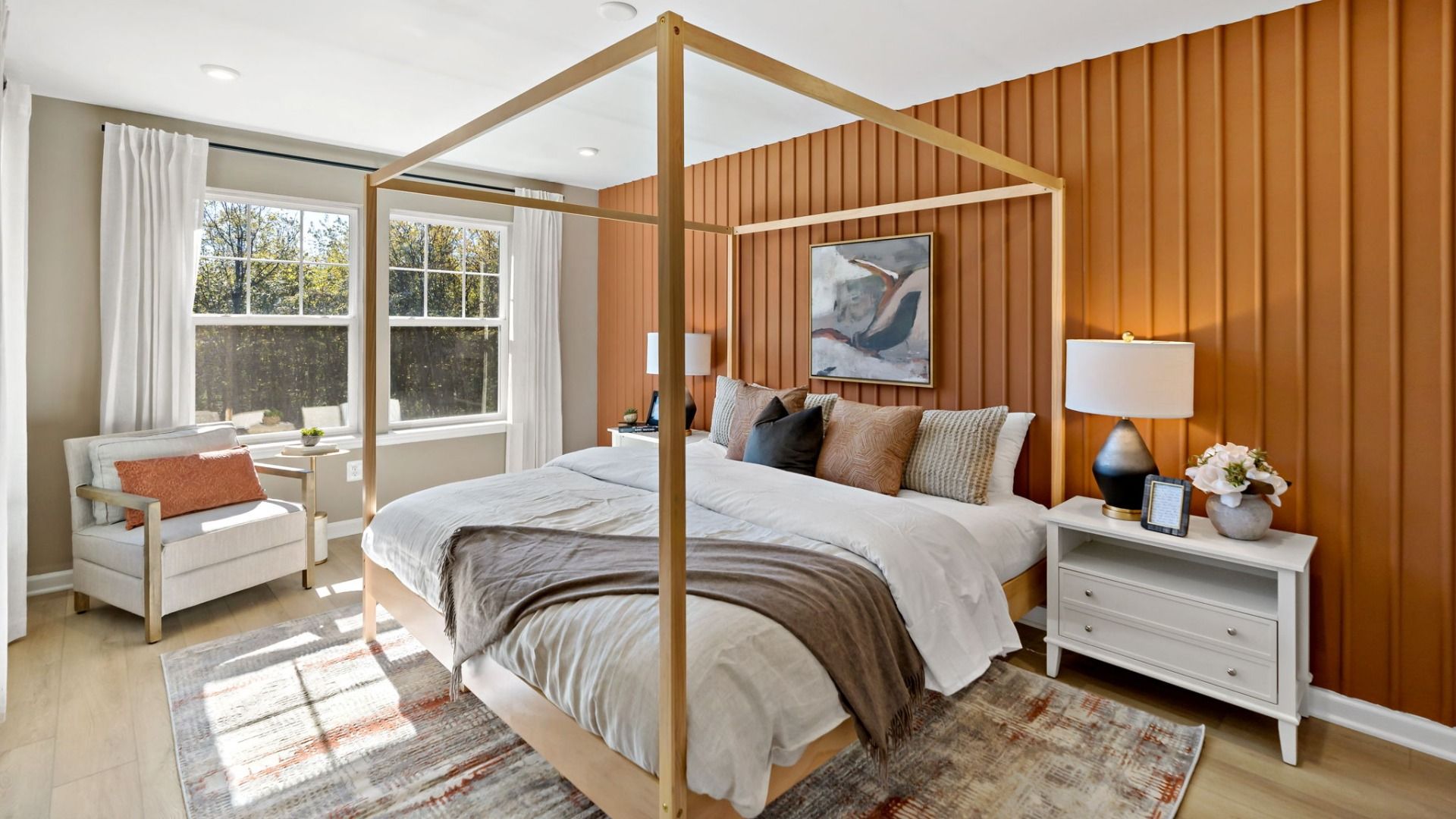 Spacious owner’s suite featuring a large window that fills the room with natural light.