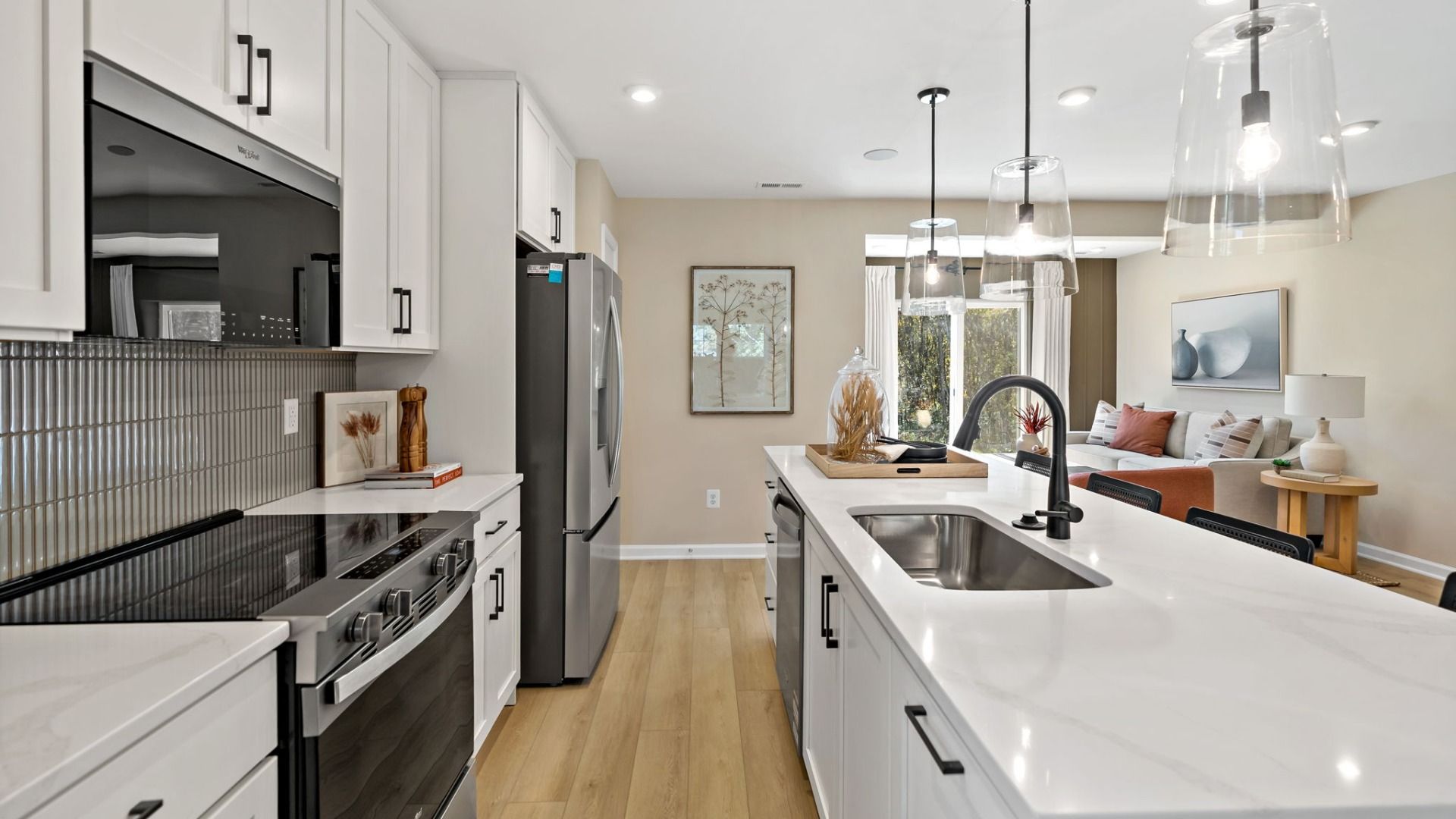 Explore the Madison II kitchen with stainless steel appliances and a spacious center island.