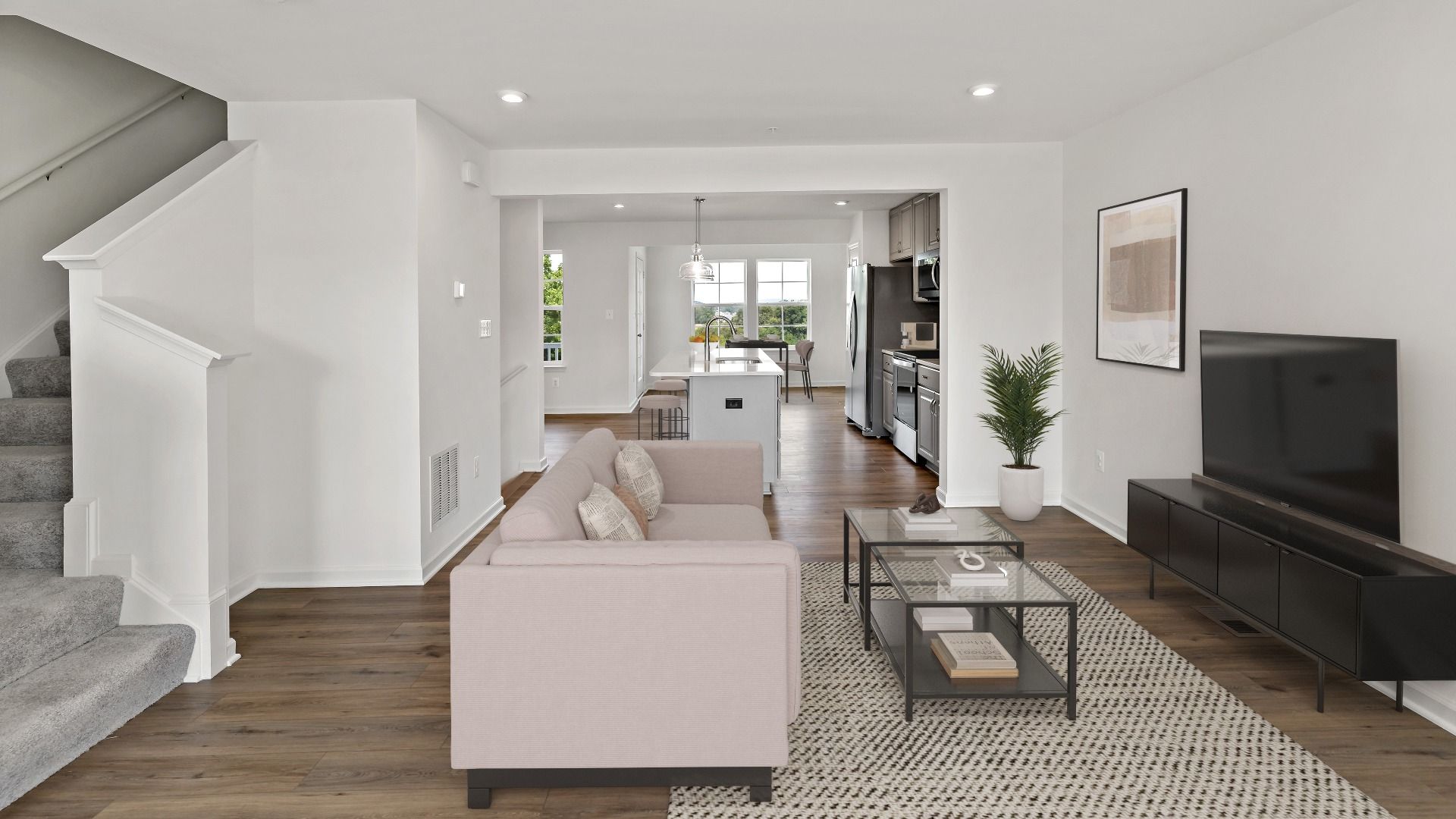 Open-concept first floor featuring the living room, kitchen, and dining area in the York II Garage.