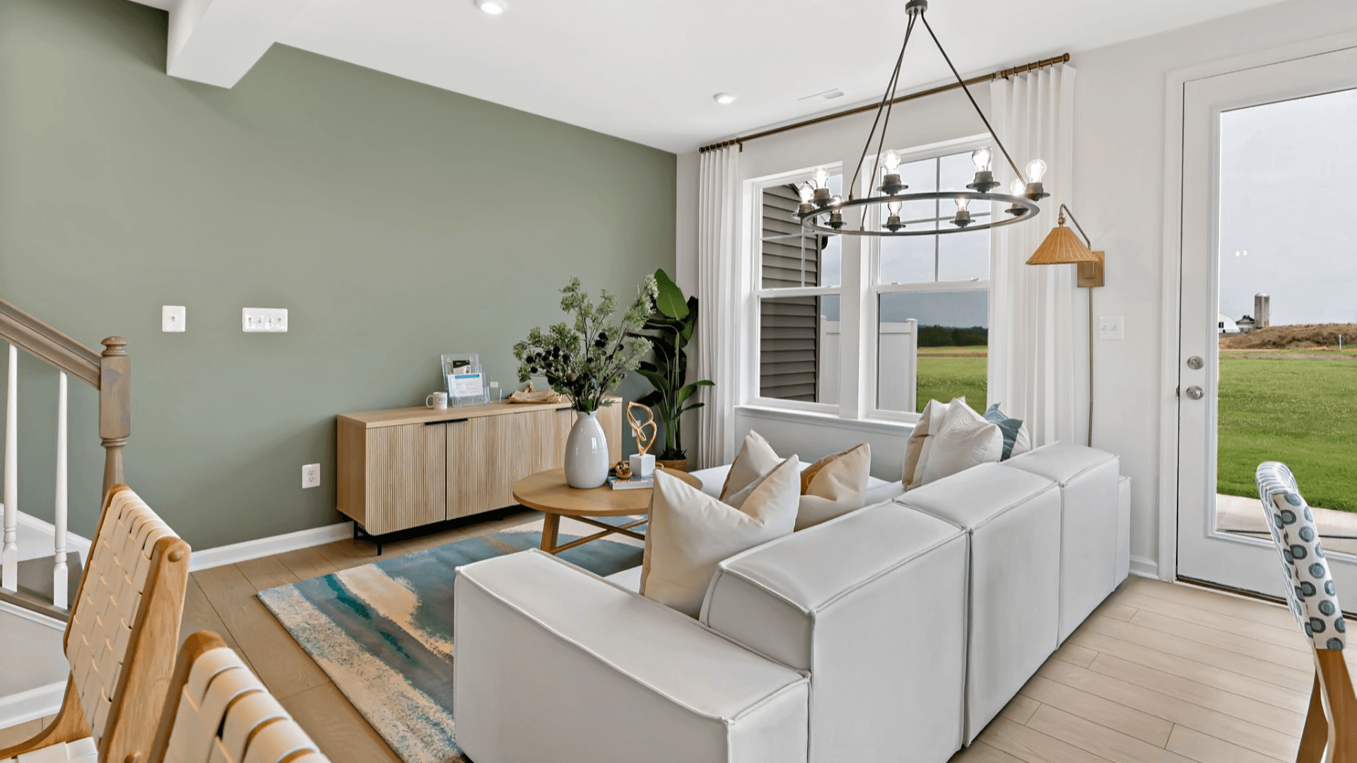 Lynnhaven living area featuring large windows.