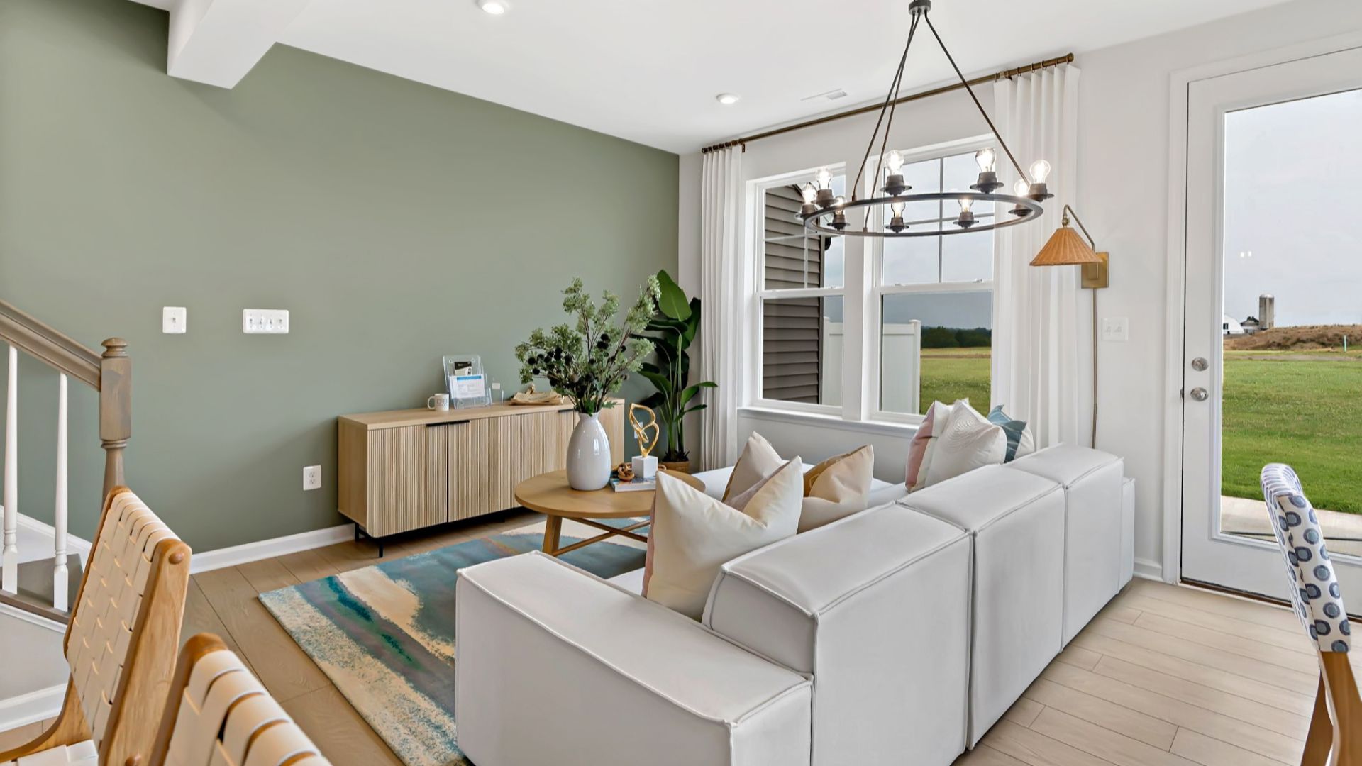 Lynnhaven living area featuring large windows.