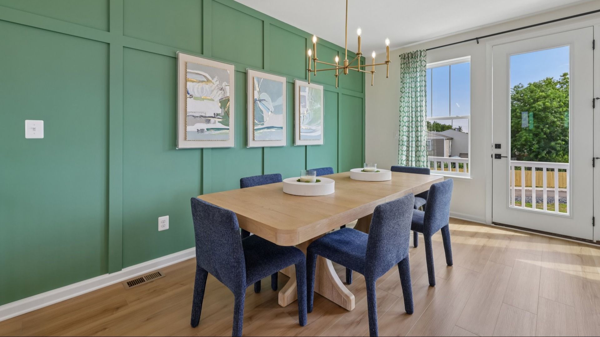 The Upton model home features a color drenched wall in the open dining room