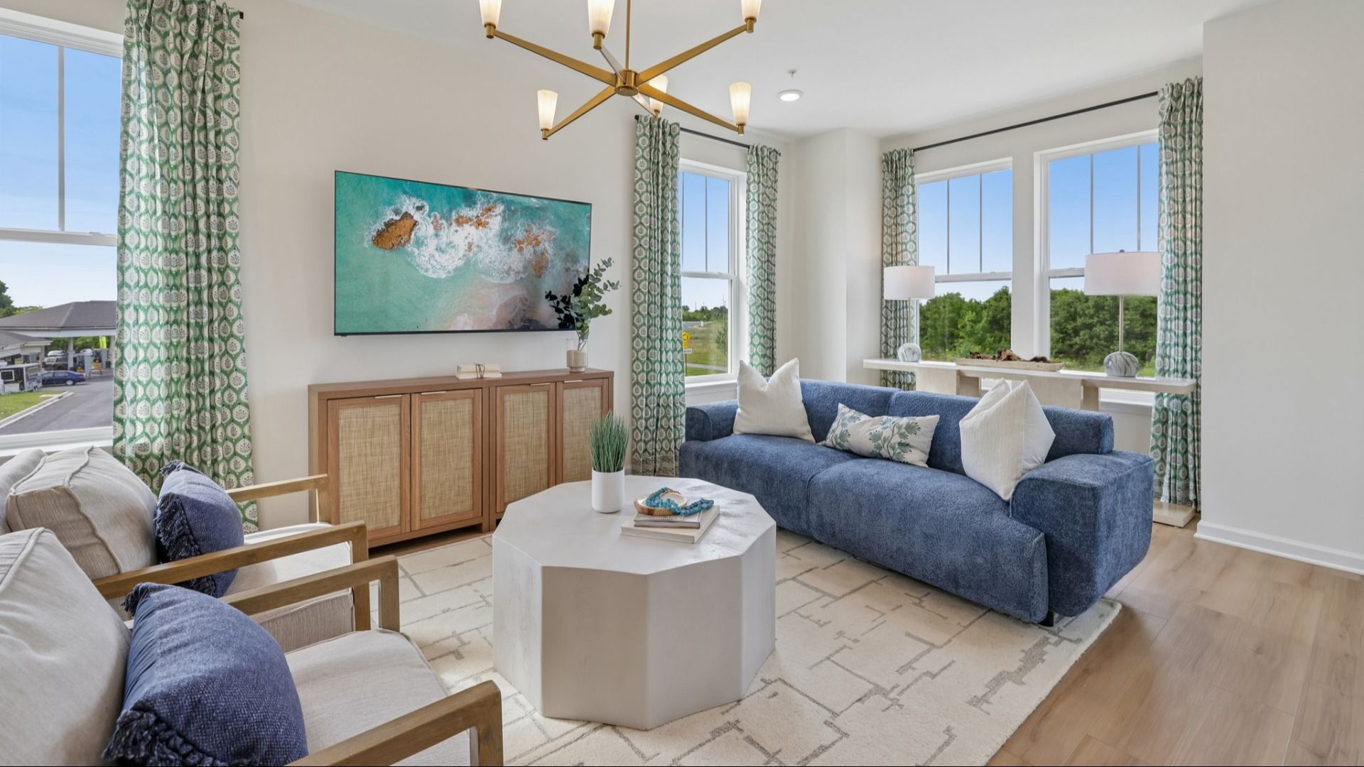 Relax in the cozy Great Room flooded with natural light
