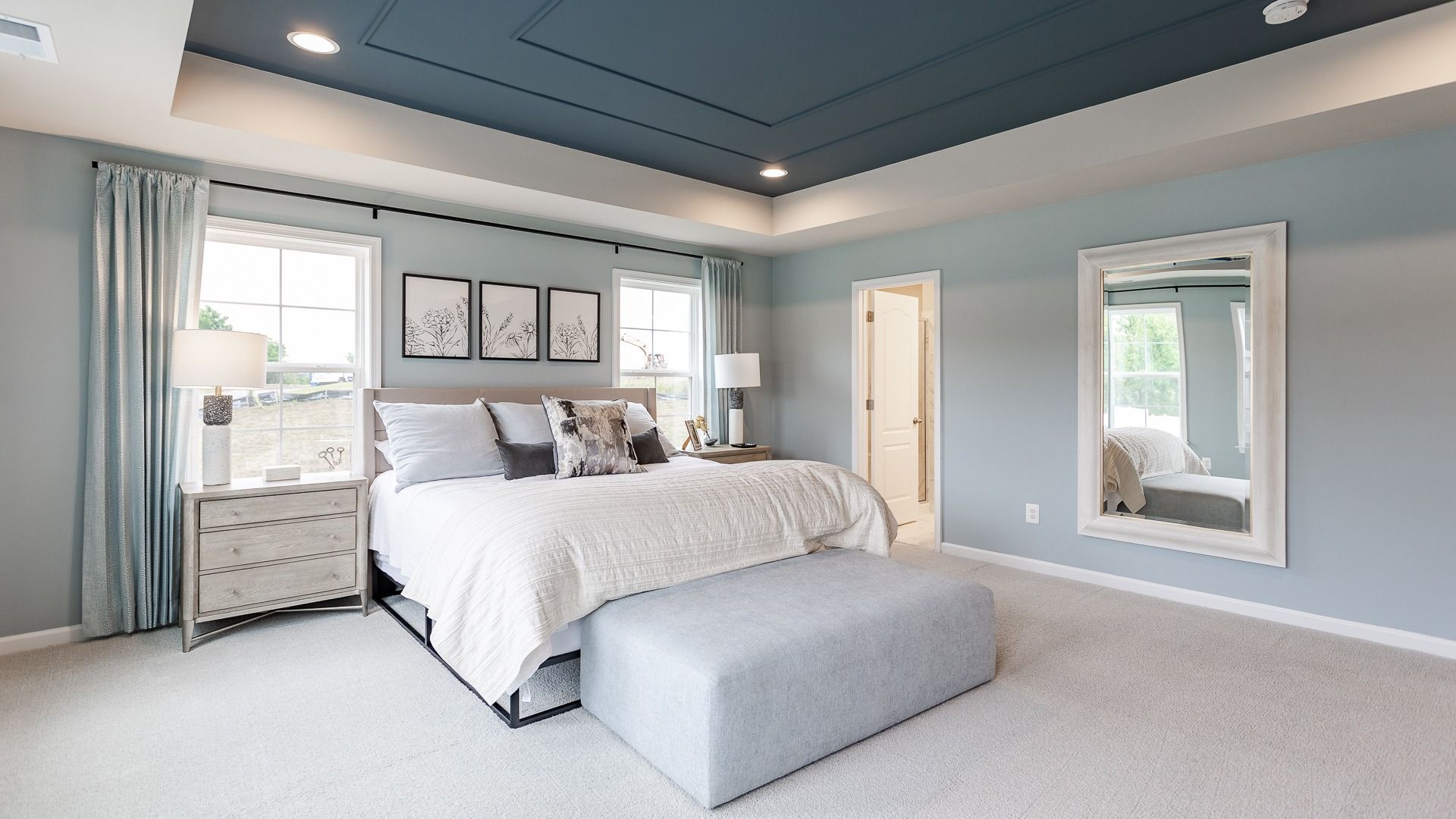 The Owner's Suite with Tray Ceiling in a DRB Homes Carnegie II Model Home