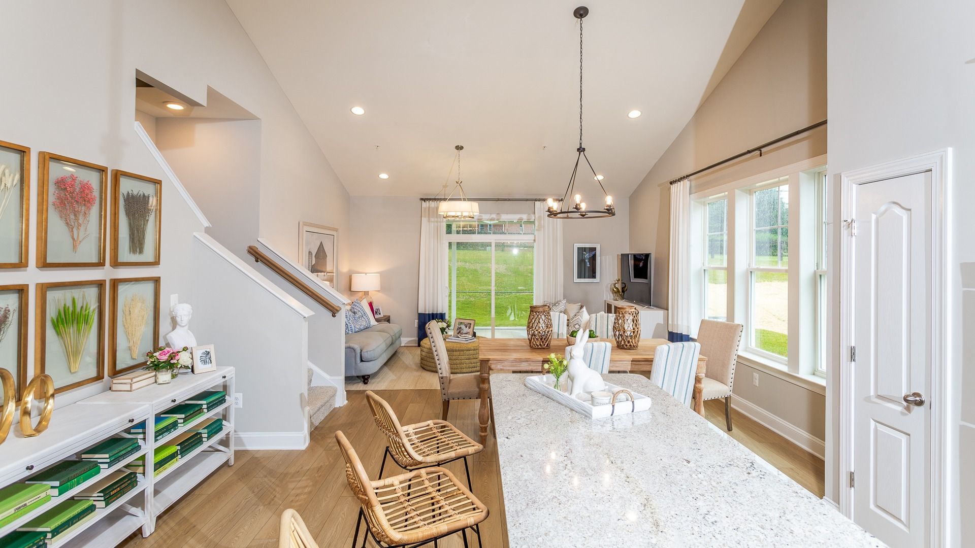 The main level of the Starling II floor plan offers an open layout dining and living area.