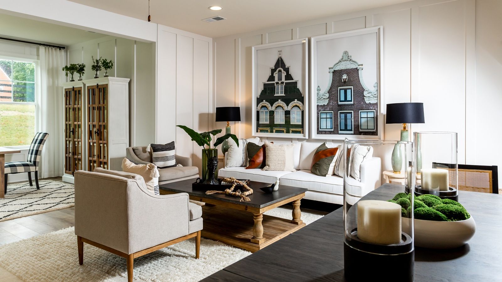 The Living Room with Comfortable Seating in the DRB Homes Finch Model at Rosehill Manor