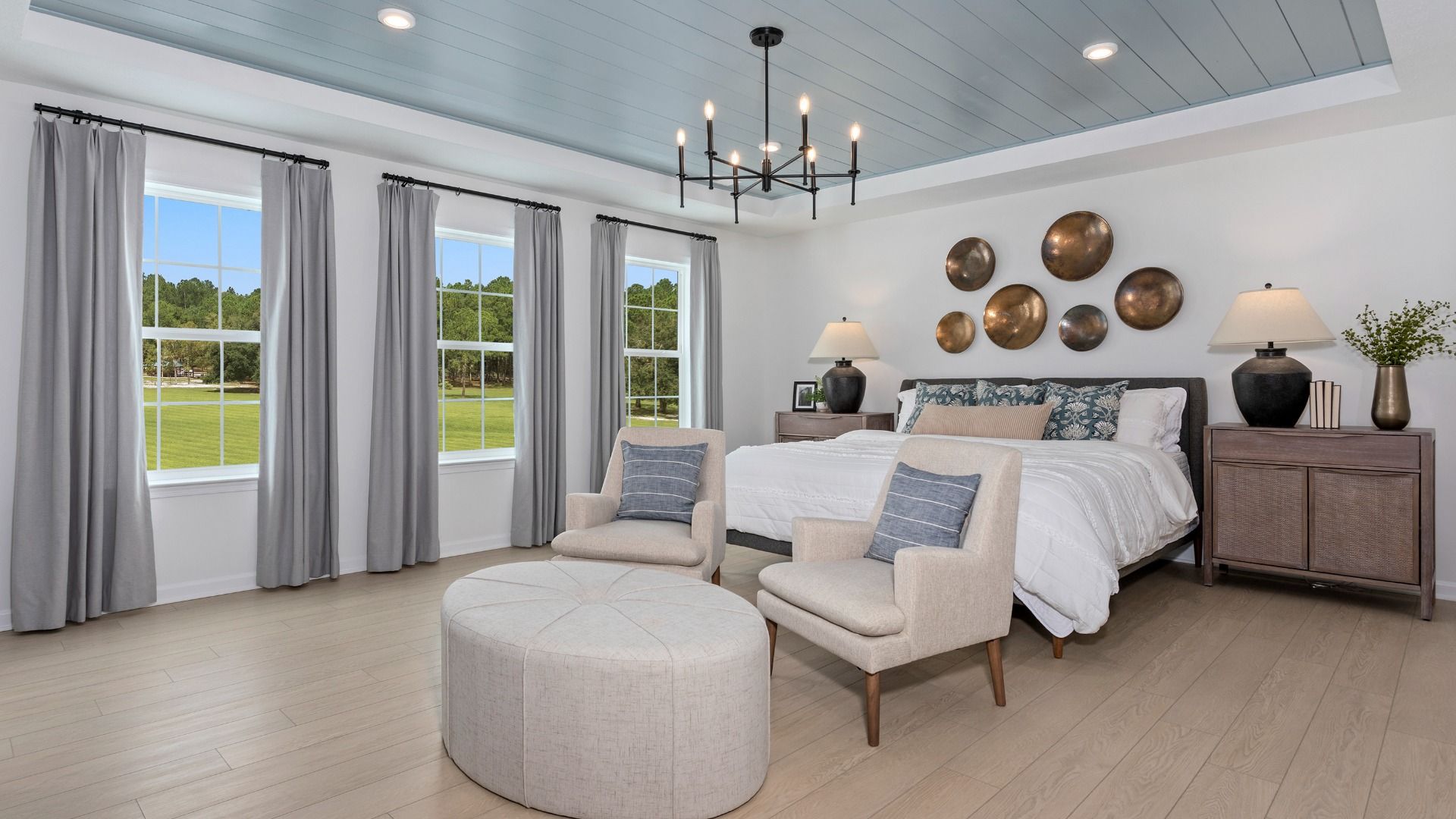 Bright and spacious Carnegie II owner’s suite with three large windows for natural light.