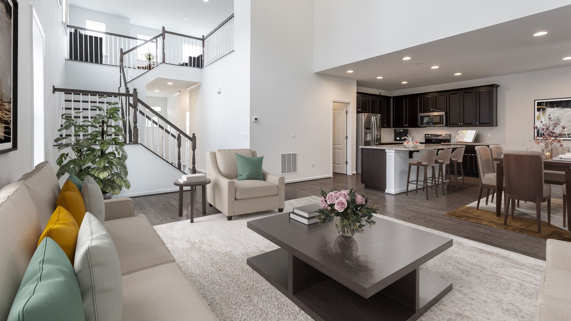 Open concept family room with comfortable seating and elegant features in the Raymore floor plan.