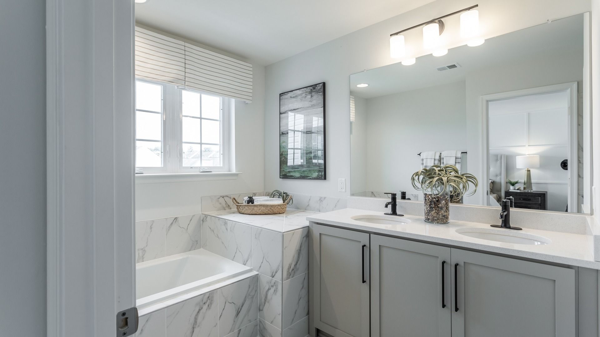 With a dual sink vanity and separate tub, the owner’s bath in the York II offers comfort and style.