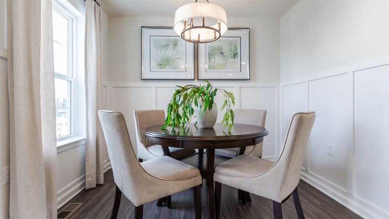 Gather in the cozy dining room of the York II model home, ideal for meals and time together.