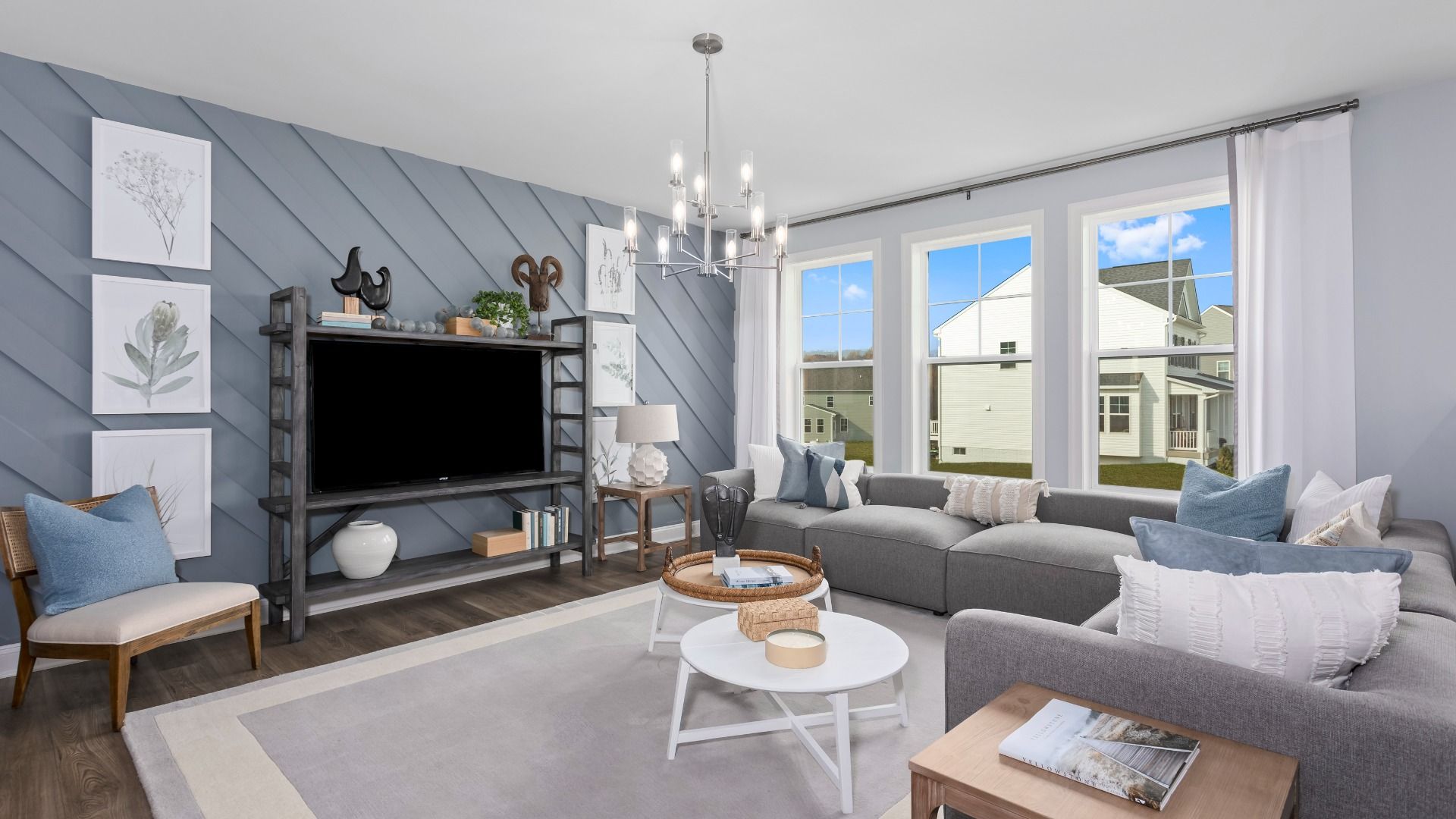 Relax in the spacious and bright open-concept living room in the Bridgeport II floor plan.