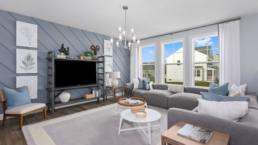 Relax in the spacious and bright open-concept living room in the Bridgeport II floor plan.