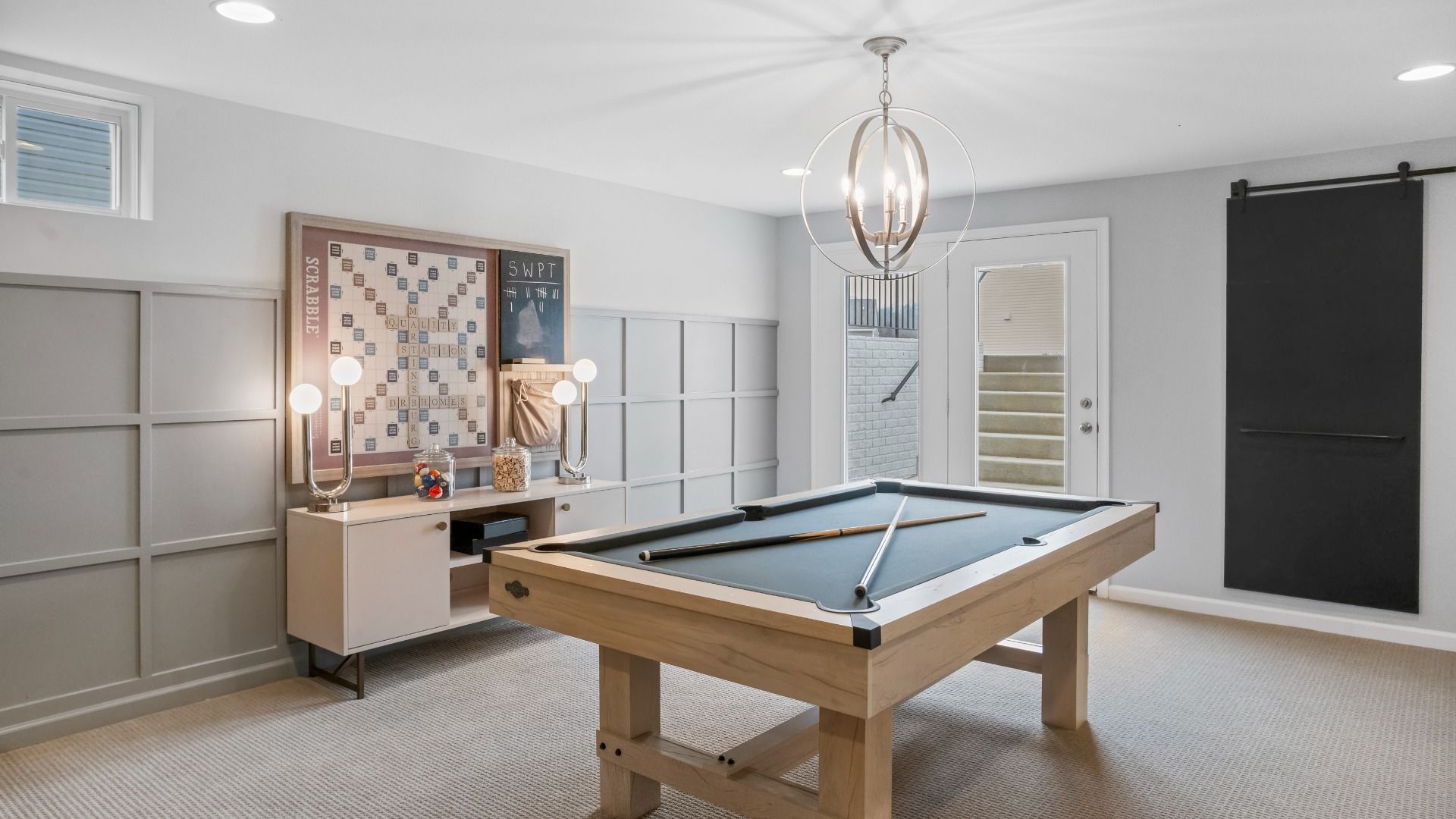 The Bridgeport II game area with space for a pool table and plenty of room for entertainment.