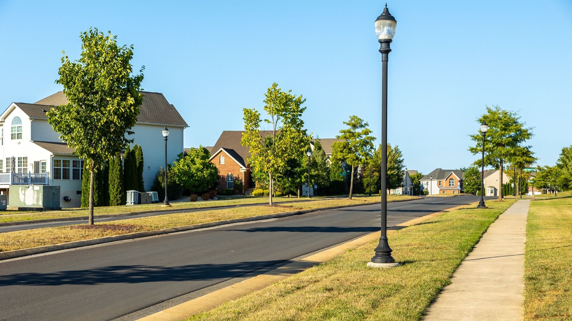 Welcoming greenery marks the community entrance, creating an inviting environment for residents.