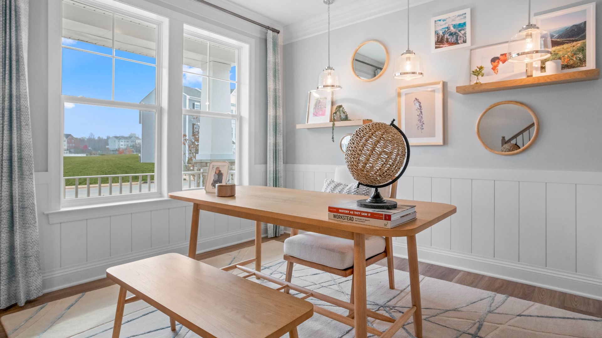 A spacious home office featuring rustic accents for a warm and inviting workspace.