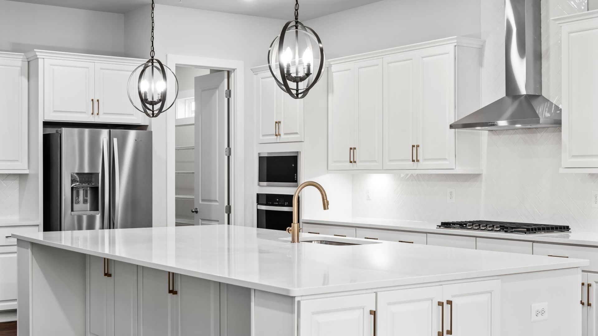 A Luxurious Chef's Kitchen with a Walk-In Pantry in the Creighton at South Lake
