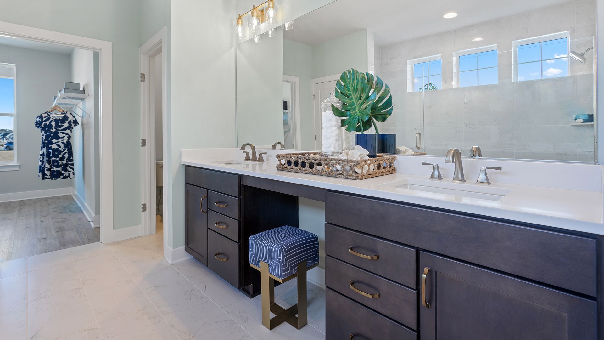 Relax in the Luxurious, Spa-Inspired Owner's Suite Bathroom in the Barbados at South Lake