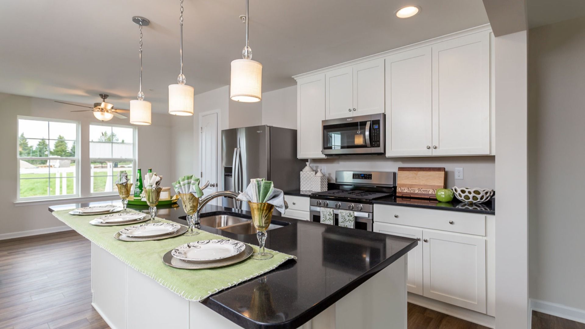 Modern kitchen in York II South Brook Townhome by DRB Homes with name-brand appliances and stylish cabinetry in Inwood, WV.
